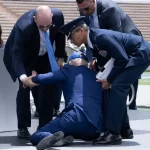 President Biden falls on Air Force stage